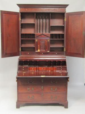A George III mahogany bureau cabinet