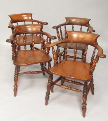 A Harlequin set of four 19thC yew and elm smoker's bow chairs