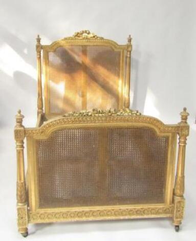 A French style gilt wood single bed