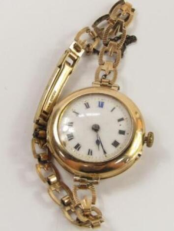 A lady's 15ct gold circular cased wristwatch