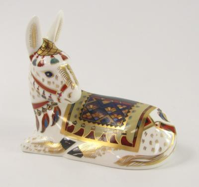 A Royal Crown Derby Imari paperweight modelled as a recumbent donkey