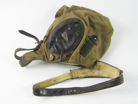 A Third Reich Luftwaffe airman's fabric and leather head protector