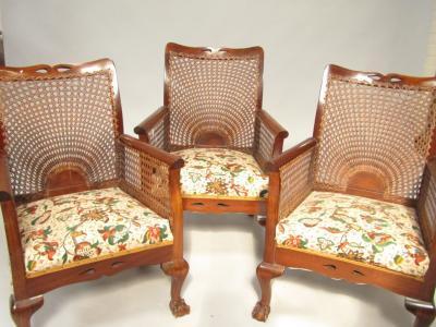 A set of three early 20thC mahogany bergere armchairs