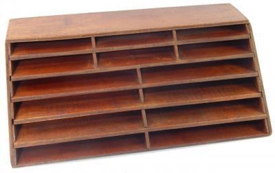 An oak stationery rack