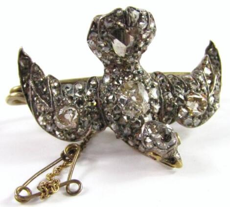 A 9ct gold diamond set bird brooch