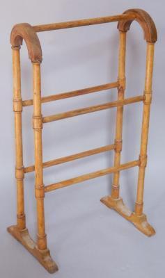 A Victorian stained beech towel rail