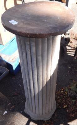 A fluted stone column