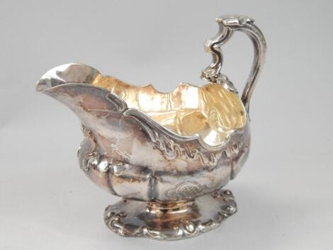 A white metal sauce boat in 18thC style