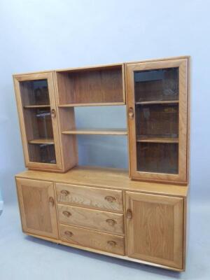 An Ercol light elm dresser unit