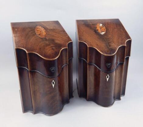 A pair of George III mahogany knife boxes