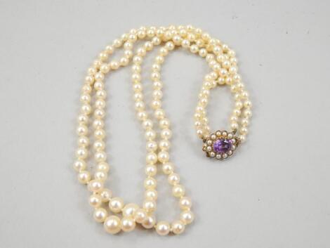 A double row simulated pearl necklace