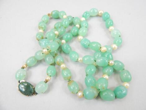 A string of Chinese green jadeite and pearl beads