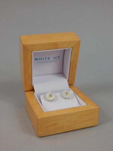 A pair of White Ice earrings