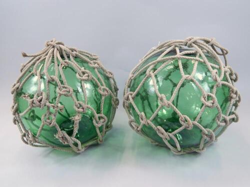 A pair of large size ships green glass net casts or floats