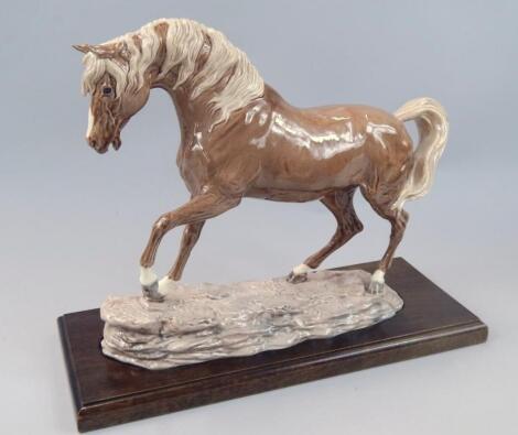 A Charm of Creamware figure of a horse