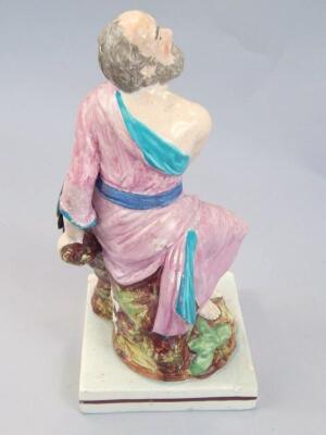 An early 19thC pearl ware figure of gentleman aside raven - 2