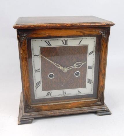 A mid-20th oak cased mantel clock