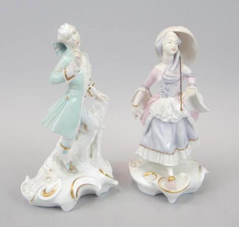 A pair of Royal Worcester porcelain figures