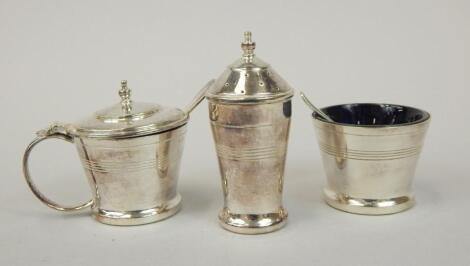 A silver plated Art Deco style three piece cruet