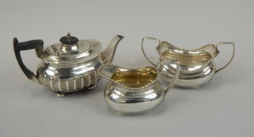 A matched silver plated three piece tea service