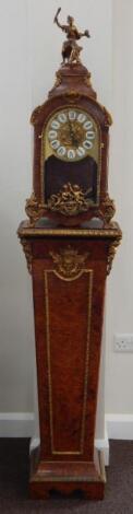 A Continental walnut and gilt metal mantel clock