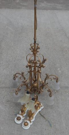 A late 19thC gilt iron chandelier