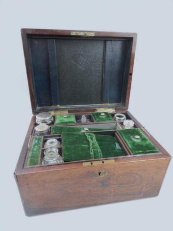 A Victorian rosewood and brass bound dressing case