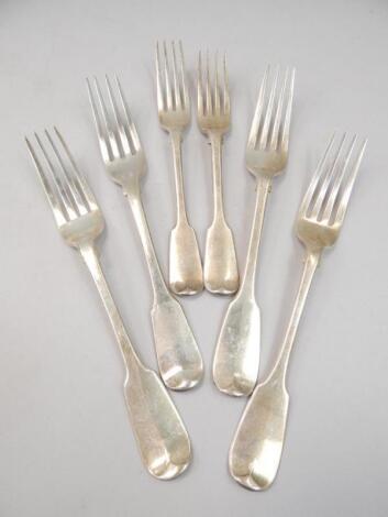 Four similar silver 19thC Fiddle pattern dinner forks