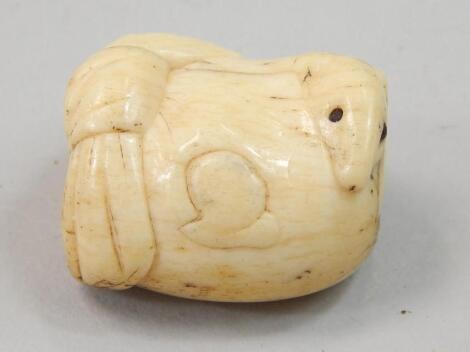 A Japanese carved bone netsuke