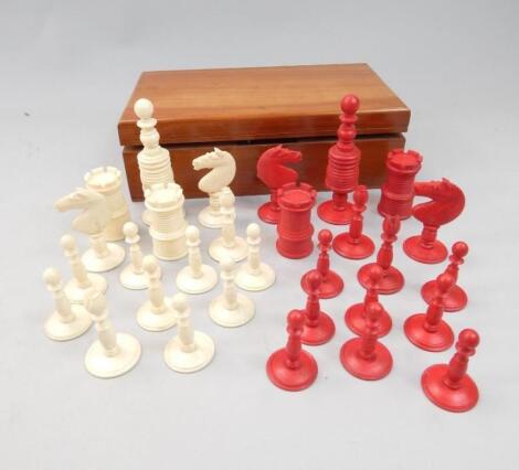 A late 19thC / early 20thC part stained ivory part chess set