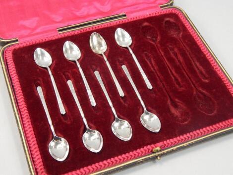 A part set of eight silver Art Deco style coffee spoons