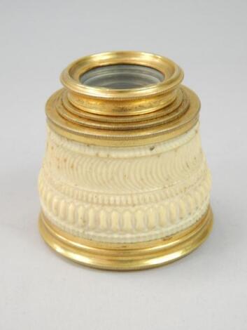 A small late 19thC ivory and gilt brass spy glass