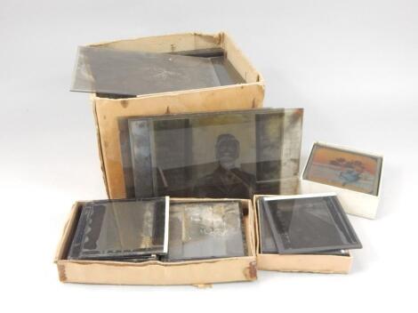 A quantity of photographic lantern slides