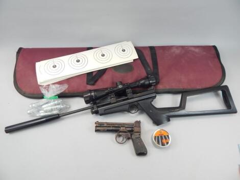 A Crosman air gun and a Webley air pistol