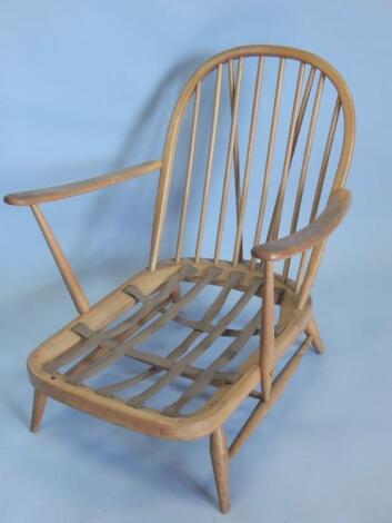 An Ercol light sand beech cottage style armchair