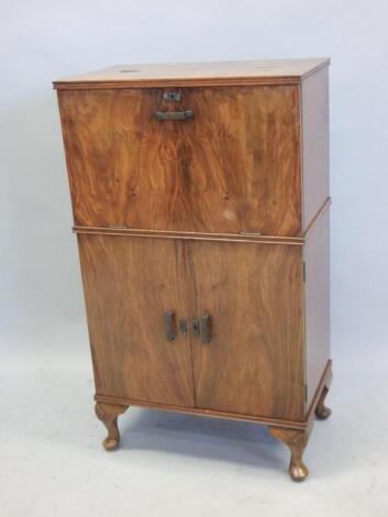 A walnut Art Deco style cocktail cabinet
