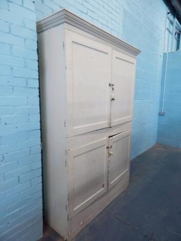 A Victorian pine cupboard