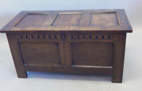 A late 17thC panelled oak coffer