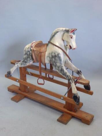 A mid 20thC Jeeves grey dapple painted rocking horse