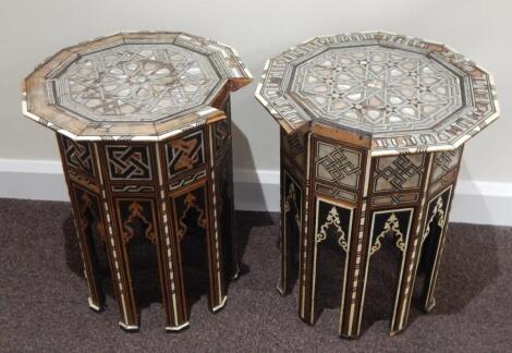 Two similar Middle Eastern mother of pearl inlaid occasional tables