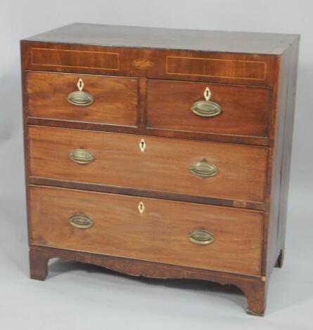 An early 19thC inlaid mahogany chest of drawers