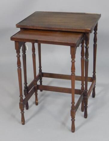 A nest of two Edwardian tables