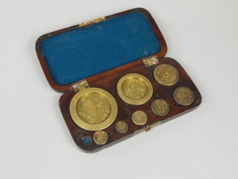 A set of brass scales and weights