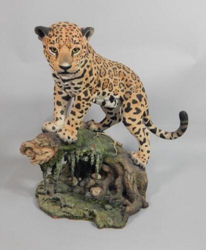 A handpainted composition or resin figure