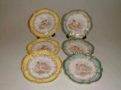 Three Limoges porcelain dessert plates