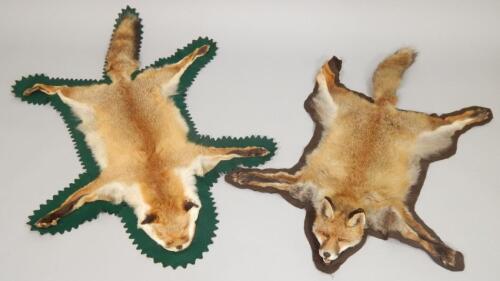 Two fox skin rugs