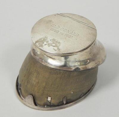 A horse hoof inkwell with silver mount