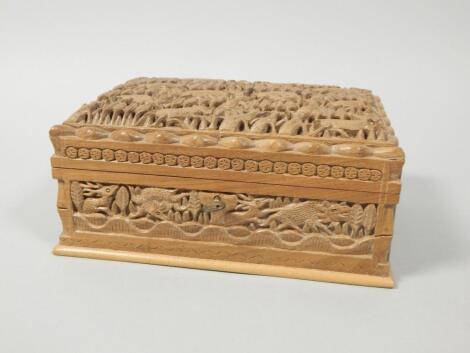 Tribal Art. A modern African carved hardwood box decorated with various animals