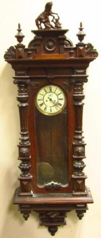 A 19thC walnut cased Vienna wall clock
