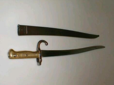 A 19thC brass handled bayonet with sheath £40-60